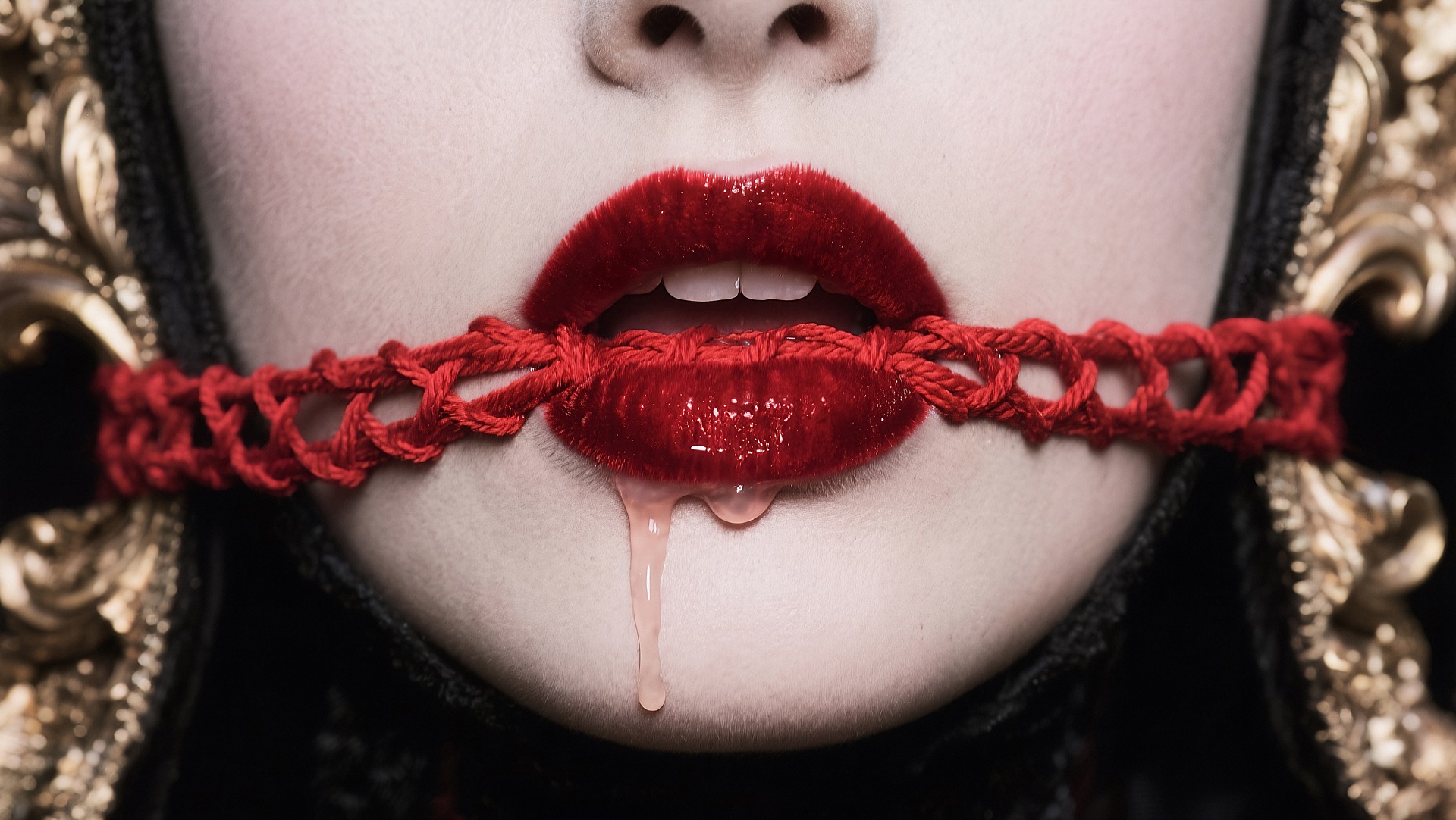 red-lips-gagged-dripping-liquid